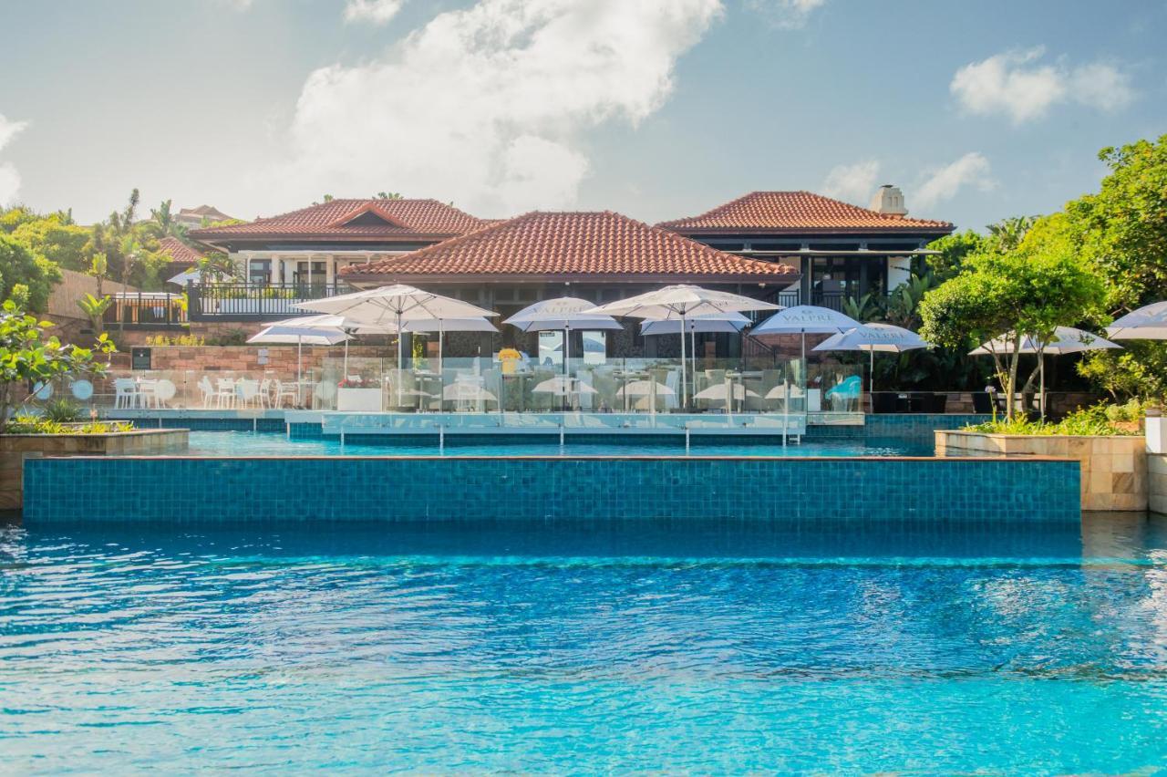 The Capital Zimbali Otel Ballito Dış mekan fotoğraf The swimming pool at the resort