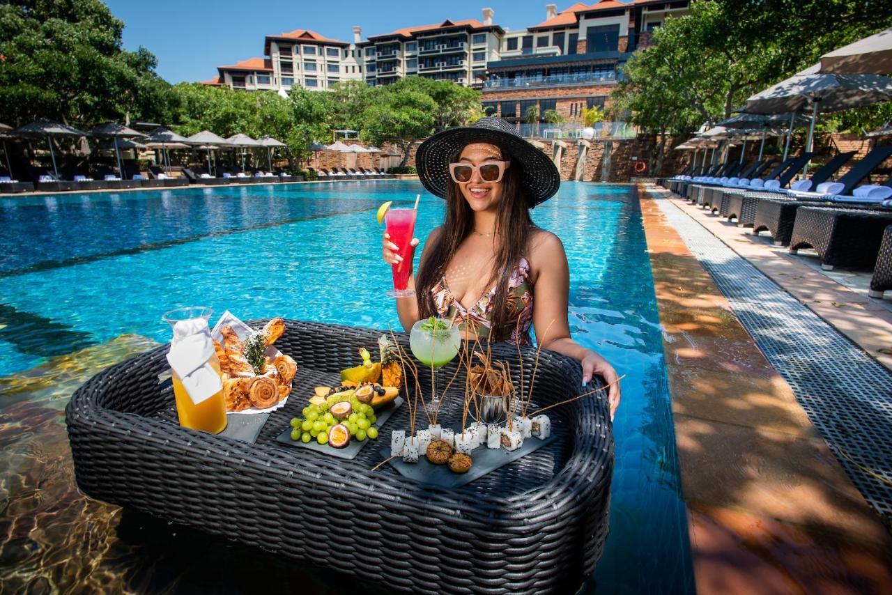 The Capital Zimbali Otel Ballito Dış mekan fotoğraf Poolside at the hotel