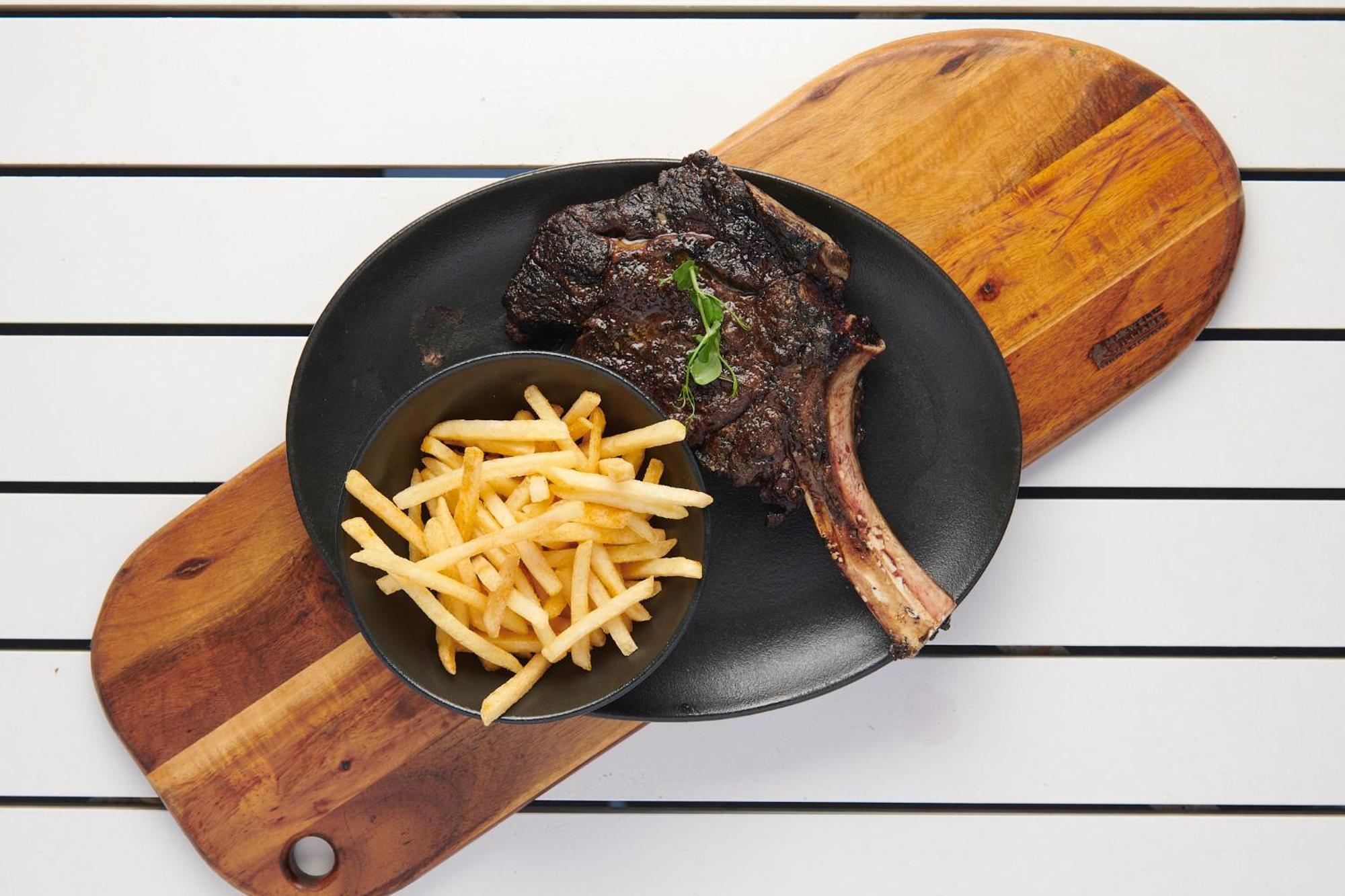 The Capital Zimbali Otel Ballito Dış mekan fotoğraf A steak and chips meal